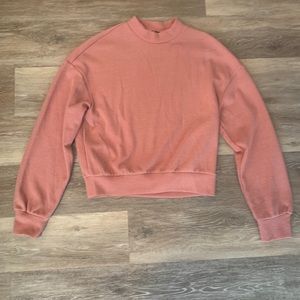 Sweater, long sleeve, high rise neck.